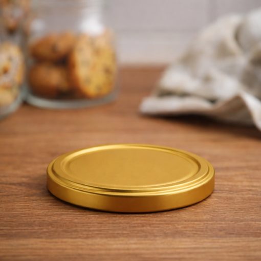 66 plechových viečok - zlaté