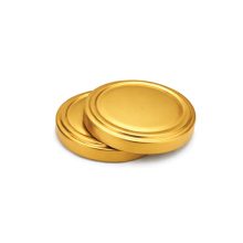 58 plechových viečok - zlatých