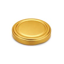 89 plechových viečok - zlatých