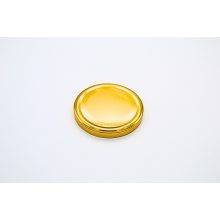 89 plechových viečok - zlatých