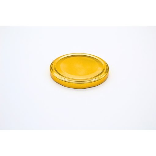 89 plechových viečok - zlatých