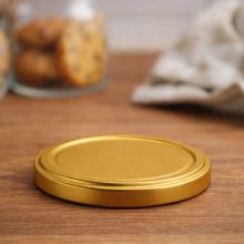 100 plechových viečok - zlaté